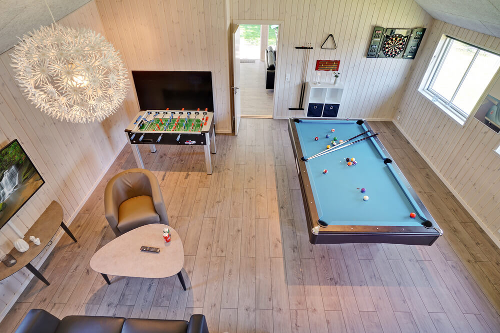 Ud over de mange timer, man kan bruge i husets pool-afdeling, så byder luksushus 720 også på billard/bordtennis og dart