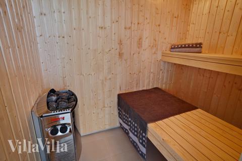 Nyd varmen i saunaen i luksushus nr. 720 til 18 personer