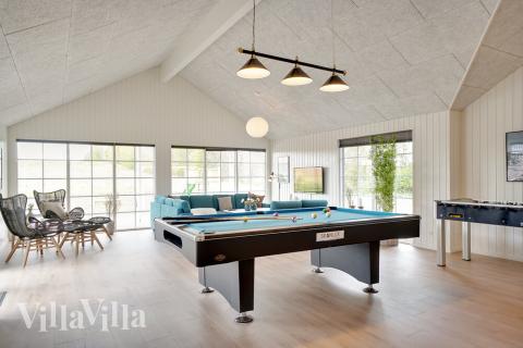 Ud over de mange timer, man kan bruge i husets pool-afdeling, så byder luksushus 442 også på billard/bordtennis og dart
