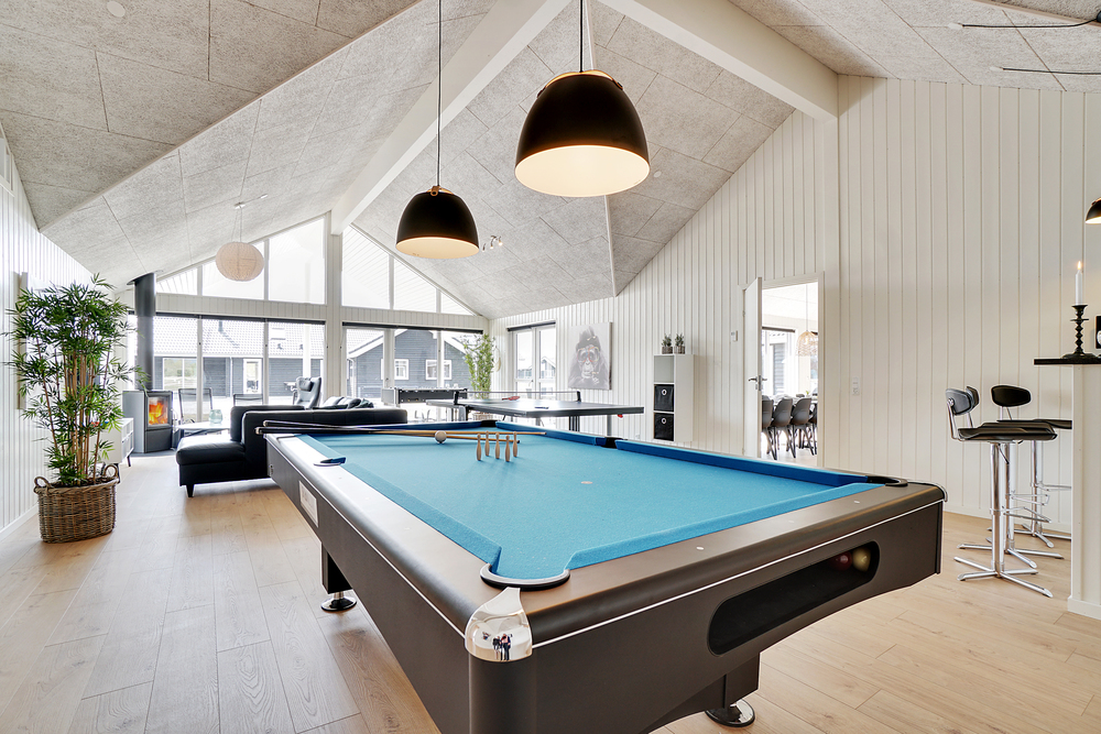 Ud over de mange timer, man kan bruge i husets pool-afdeling, så byder luksushus 448 også på billard/bordtennis og dart