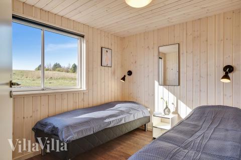 Et af de 12 soveværelser i luksushus nr. 450