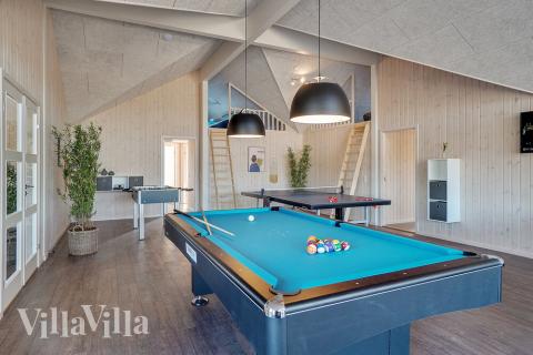 Luksushus 450 til 30 personer byder på et stort aktivitetsrum med bl.a. billard og dart