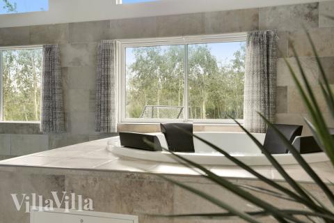 Nyd varmen i spaen i luksushus nr. 432 i Lolland/Falster/Møn