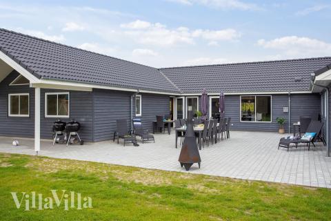 Nyd en grillaften på terrassen i luksushus nr. 432 i Lolland/Falster/Møn