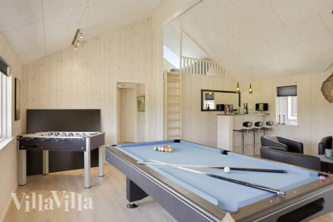 Ud over de mange timer, man kan bruge i husets pool-afdeling, så byder luksushus 433 også på billard/bordtennis og dart