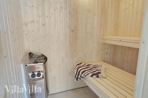 Nyd varmen i saunaen i luksushus nr. 433 til 16 personer