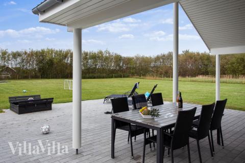 Nyd en grillaften på terrassen i luksushus nr. 433 i Lolland/Falster/Møn