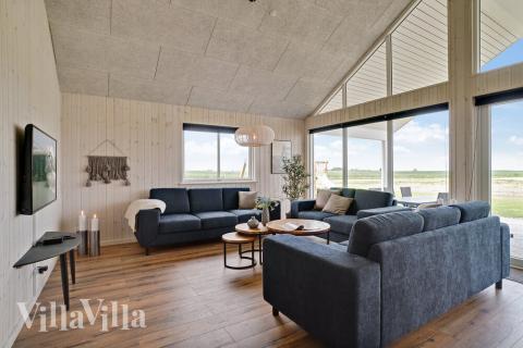 Opholdsrum med plads til 18 i luksushus nr. 437.