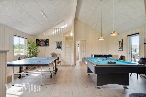 Ud over de mange timer, man kan bruge i husets pool-afdeling, så byder luksushus 453 også på billard/bordtennis og dart