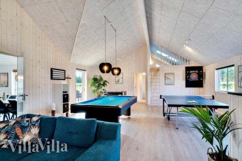 Ud over de mange timer, man kan bruge i husets pool-afdeling, så byder luksushus 455 også på billard/bordtennis og dart