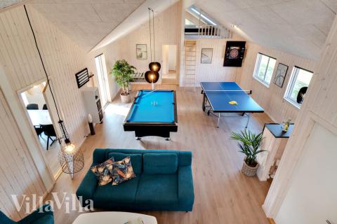 Dyst i sommerhusets aktivitetsrum, når I besøger luksushus nr. 455 i Vestjylland.