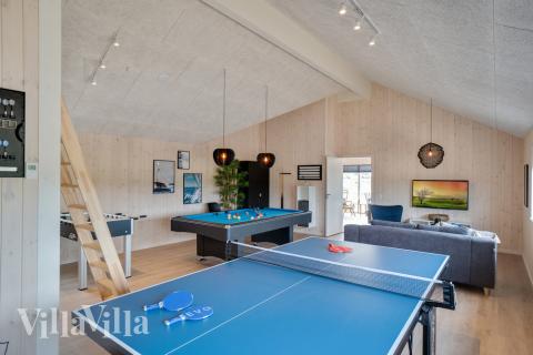 Aktivitetsrum i luksushus nr. 456 med 8 soveværelser og plads til 20 personer.