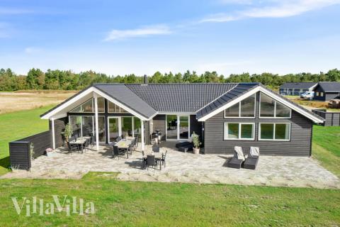 Dette skønne poolhus nr. 456 med plads til 20 personer ligger i Vestjylland