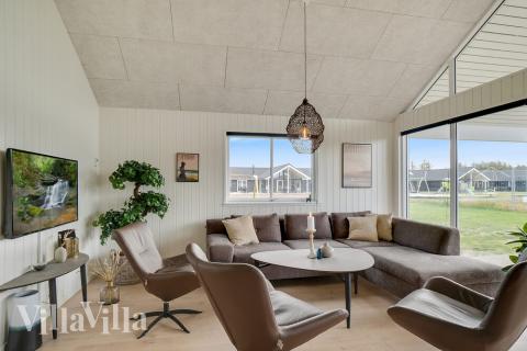 Opholdsrum med plads til 18 i luksushus nr. 458.