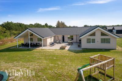 Dette skønne poolhus nr. 463 med plads til 22 personer ligger i Vestjylland
