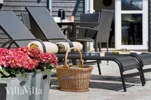 Nyd en grillaften på terrassen i luksushus nr. 461 i Vestjylland