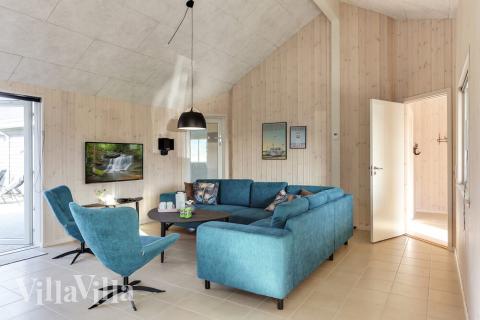 Opholdsrum med plads til 24 i luksushus nr. 447.