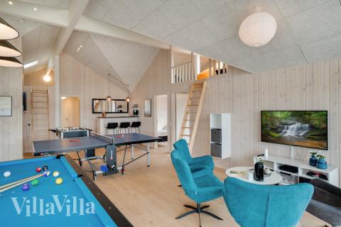Dyst i sommerhusets aktivitetsrum, når I besøger luksushus nr. 465 i Vestjylland.