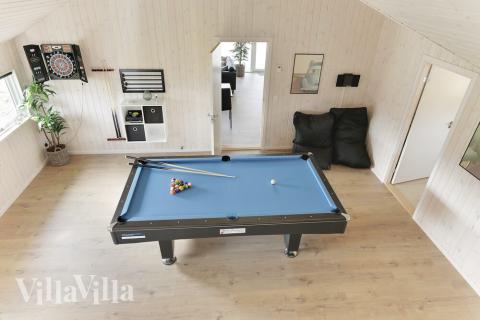 Ud over de mange timer, man kan bruge i husets pool-afdeling, så byder luksushus 452 også på billard/bordtennis og dart