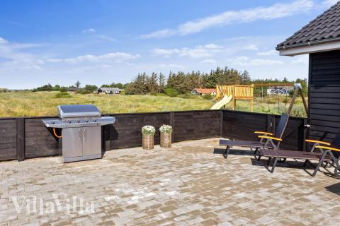 Luksushus nr. 476 har en dejlig terrasse med gode havemøbler til 20 personer.