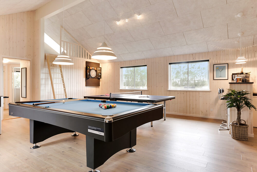 Ud over de mange timer, man kan bruge i husets pool-afdeling, så byder luksushus 445 også på billard/bordtennis og dart