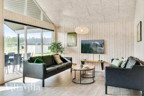 Opholdsrum med plads til 16 i luksushus nr. 464.