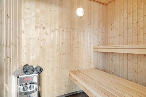 Nyd varmen i saunaen i luksushus nr. 464 til 16 personer