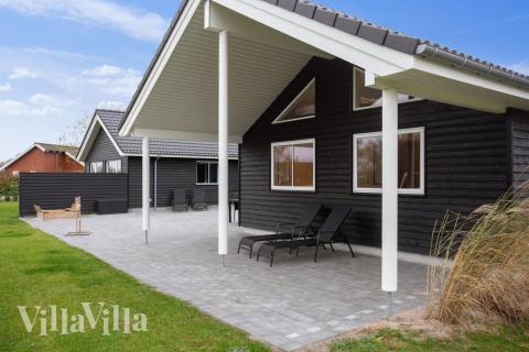 Luksushus nr. 469 har en dejlig terrasse med gode havemøbler til 22 personer.