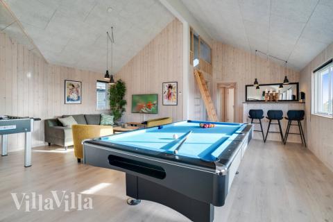 Dyst i sommerhusets aktivitetsrum, når I besøger luksushus nr. 478 i Vestjylland.