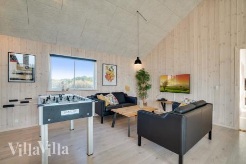 Dyst i sommerhusets aktivitetsrum, når I besøger luksushus nr. 477 i Vestjylland.