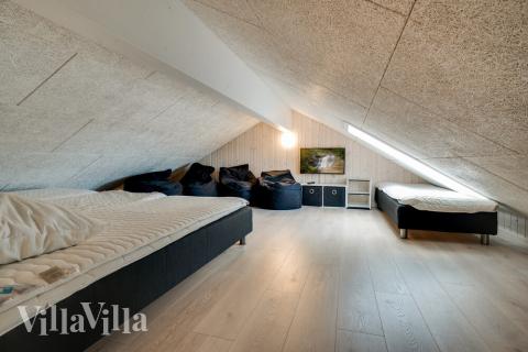 Nogle af de 18 sovepladser findes på hemsen i luksushus nr. 477