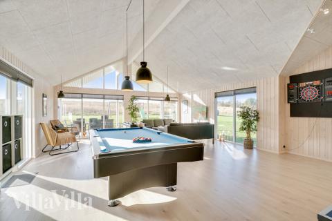 Luksushus 479 til 26 personer byder på et stort aktivitetsrum med bl.a. billard og dart