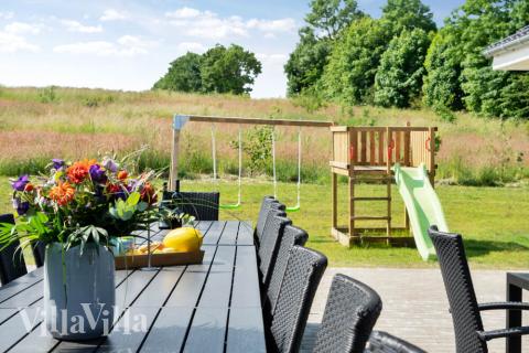 Nyd en grillaften på terrassen i luksushus nr. 480 i Østjylland