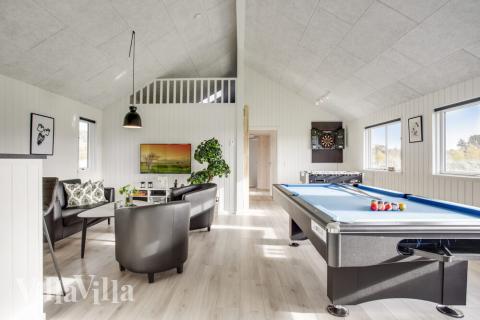 Ud over de mange timer, man kan bruge i husets pool-afdeling, så byder luksushus 489 også på billard/bordtennis og dart