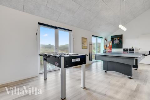 Aktivitetsrum i luksushus nr. 486 med 7 soveværelser og plads til 20 personer.