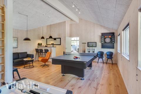 Ud over de mange timer, man kan bruge i husets pool-afdeling, så byder luksushus 494 også på billard/bordtennis og dart