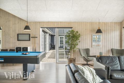 Dyst i sommerhusets aktivitetsrum, når I besøger luksushus nr. 500 i Nordjylland.