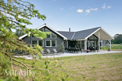 Dette skønne poolhus nr. 726 med plads til 18 personer ligger i Tyskland