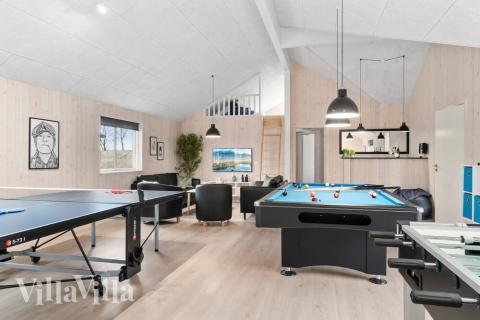 Dyst i sommerhusets aktivitetsrum, når I besøger luksushus nr. 730 i Tyskland.