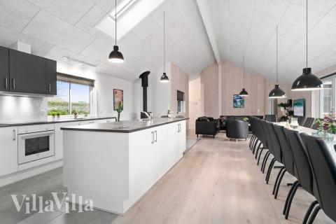 Opholdsrum med plads til 24 i luksushus nr. 730.