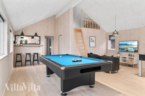 Aktivitetsrum i luksushus nr. 733 med 7 soveværelser og plads til 18 personer.