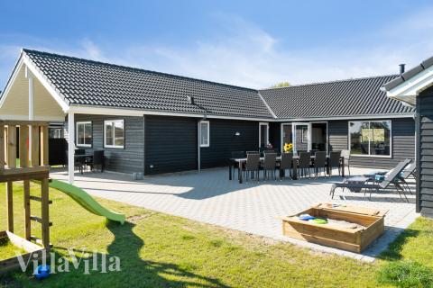 Nyd en grillaften på terrassen i luksushus nr. 731 i Tyskland