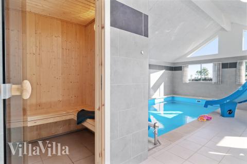 Nyd varmen i saunaen i luksushus nr. 729 til 24 personer