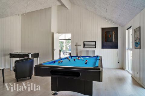 Ud over de mange timer, man kan bruge i husets pool-afdeling, så byder luksushus 503 også på billard/bordtennis og dart