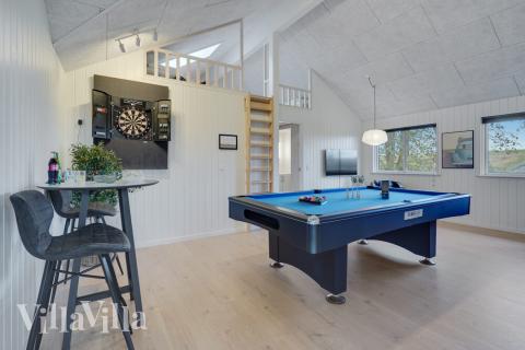 Aktivitetsrum i luksushus nr. 511 med 5 soveværelser og plads til 14 personer.