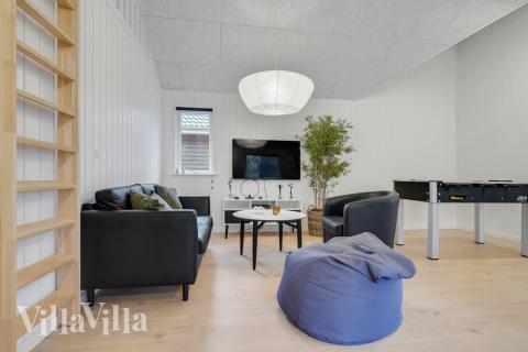 Dyst i sommerhusets aktivitetsrum, når I besøger luksushus nr. 513 i Lolland/Falster/Møn.