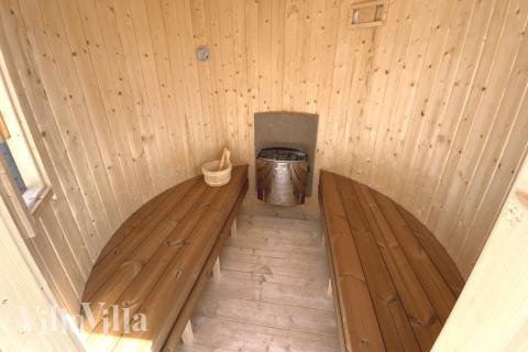 Nyd varmen i saunaen i luksushus nr. 515 til 14 personer