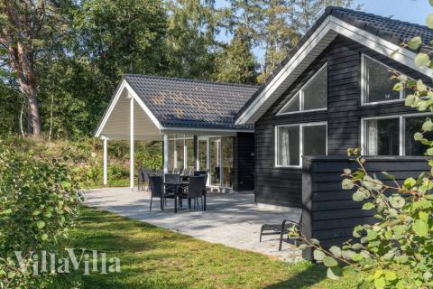 Nyd en grillaften på terrassen i luksushus nr. 517 i Lolland/Falster/Møn