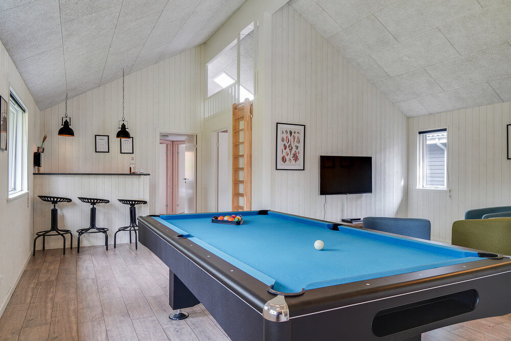Ud over de mange timer, man kan bruge i husets pool-afdeling, så byder luksushus 506 også på billard/bordtennis og dart