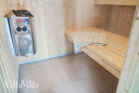 Nyd varmen i saunaen i luksushus nr. 506 til 18 personer